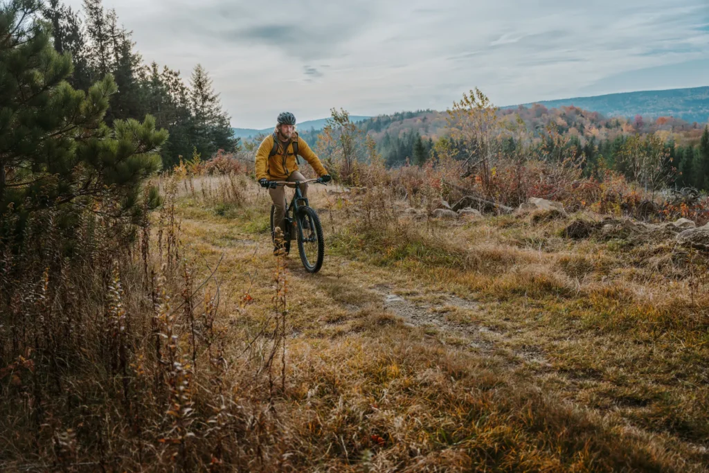 Mountain Trail bike rider with a fall sunset at Snowshoe Mountain, WV.