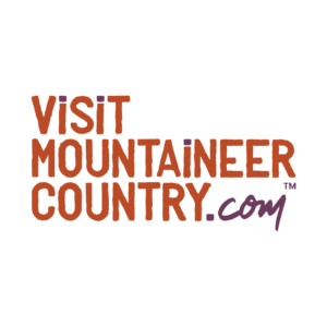 The Visit Mountaineer Country.com Logo is on a white background with orange and plum letters.